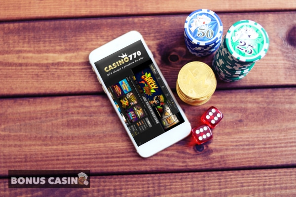 casino770 sur smarthphone avec jetons et dés de jeu, logo bonuscasino